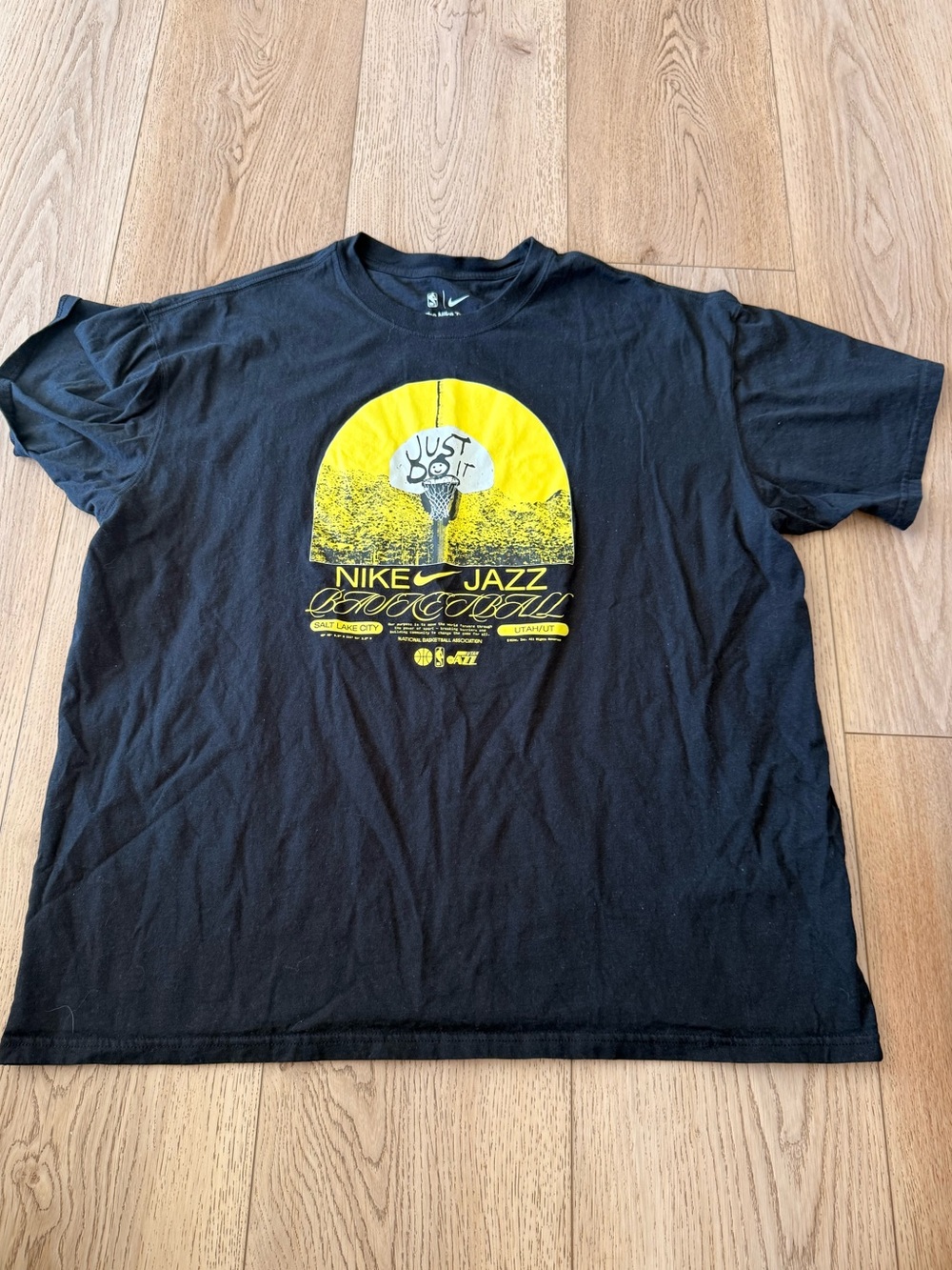 Nike Black T-Shirt with Yellow 'Nike Jazz' Graphic